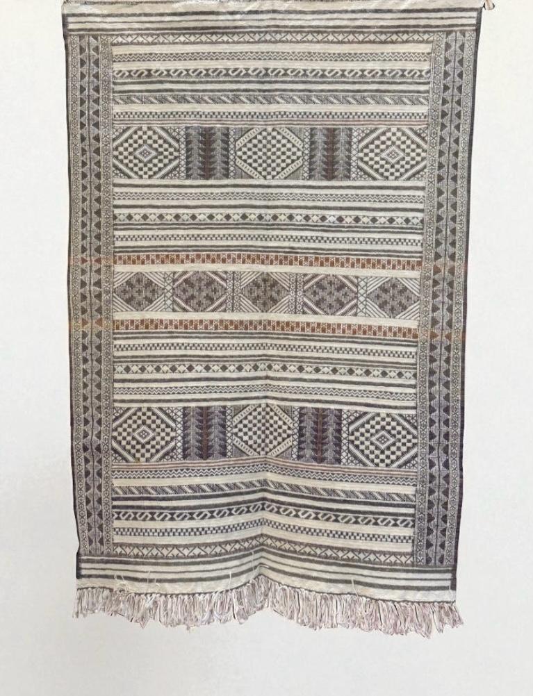 Faded and washed atlas low pile kilim rug